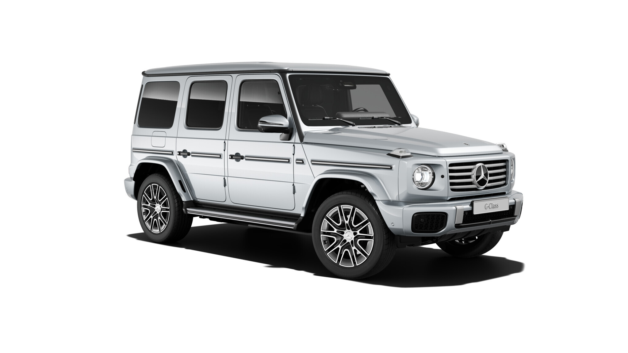 G 580 with EQ Technology | Laddning ingår | Mercedes-Benz Mercedes-Benz elektriske G-Klass på skiftande ljus bakgrund