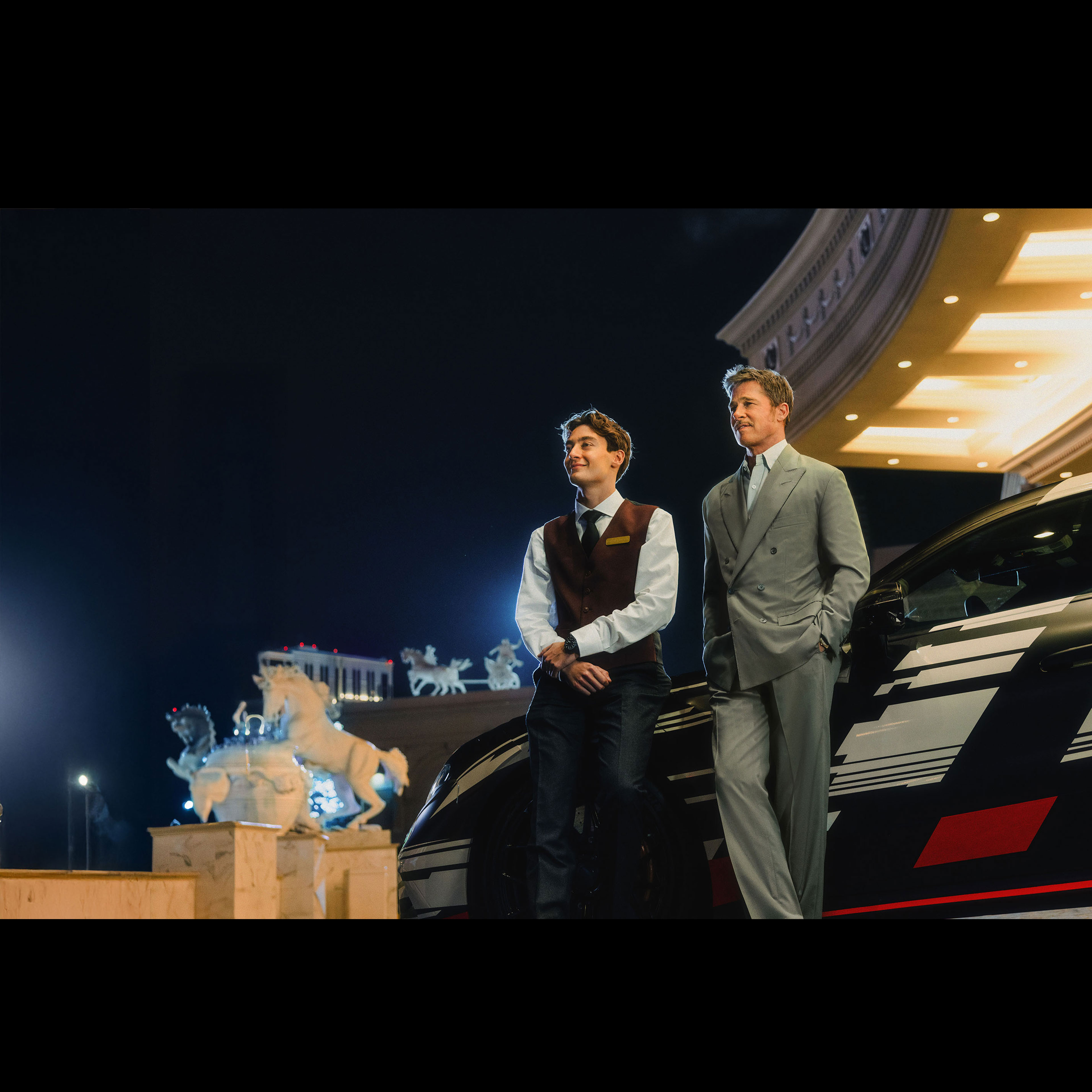 AMG.EA | Mercedes-AMG Brad Pitt och hotellanställd framför Nya CONCEPT AMG GT XX.