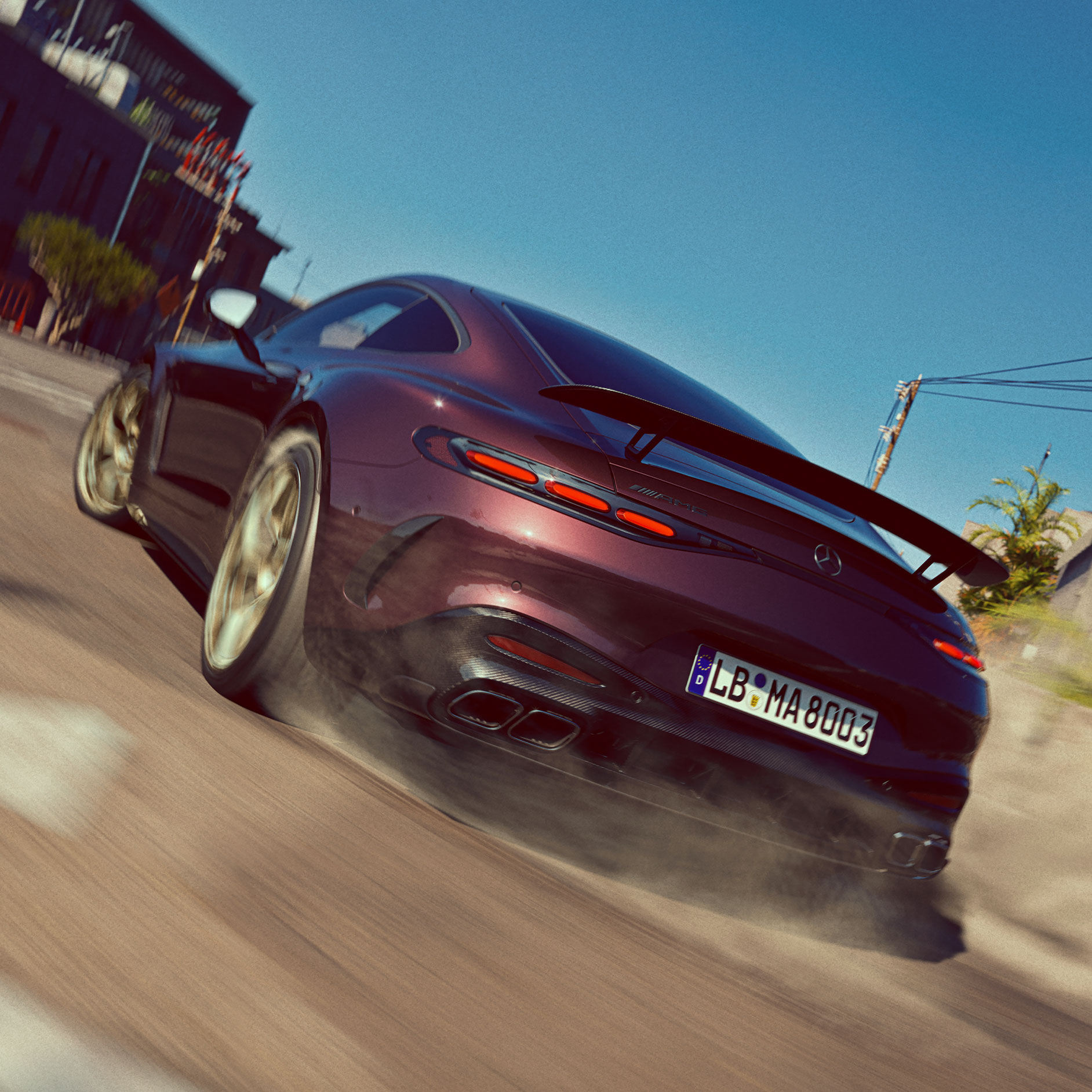 En anda av sportiga prestanda | GT Coupé | Mercedes-AMG Bakpartiet på en GT Coupé från Mercedes-AMG som kör snabbt på gatan.