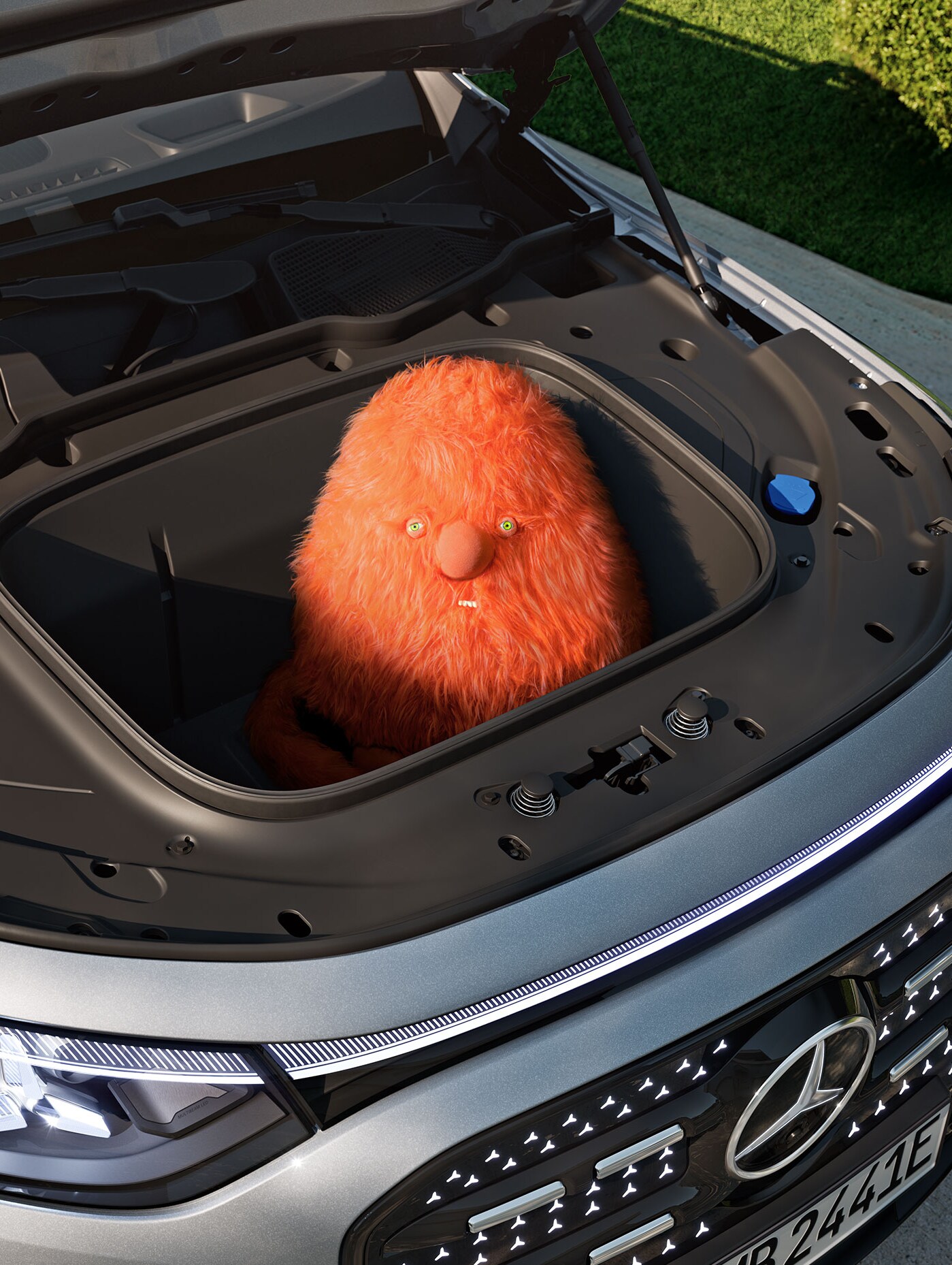 Orange troll i bagageutrymmet fram på den helt nya helelektriska GLB