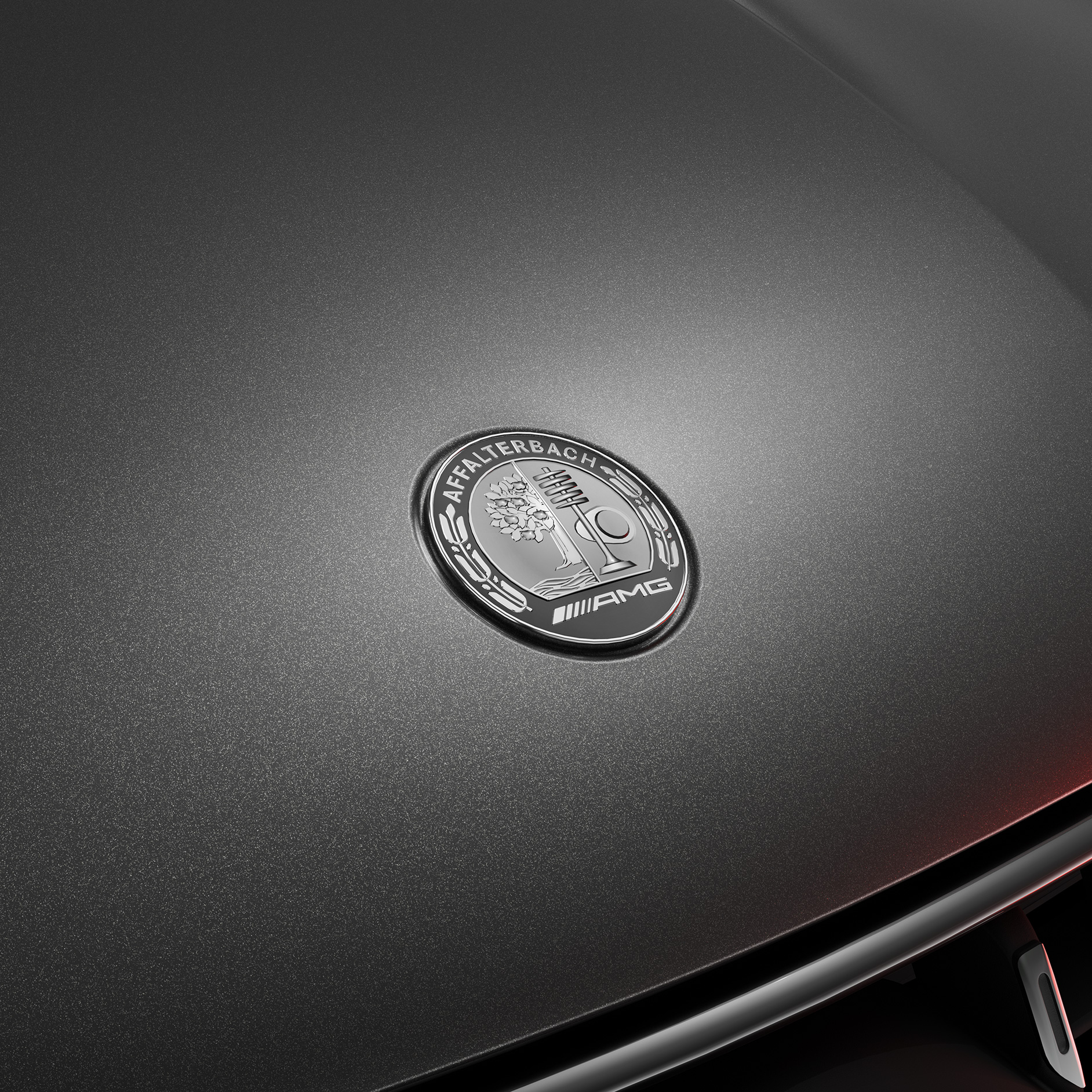 Lär känna oss | Experiences | Mercedes-AMG Affalterbach-logotypen på en Mercedes-AMG