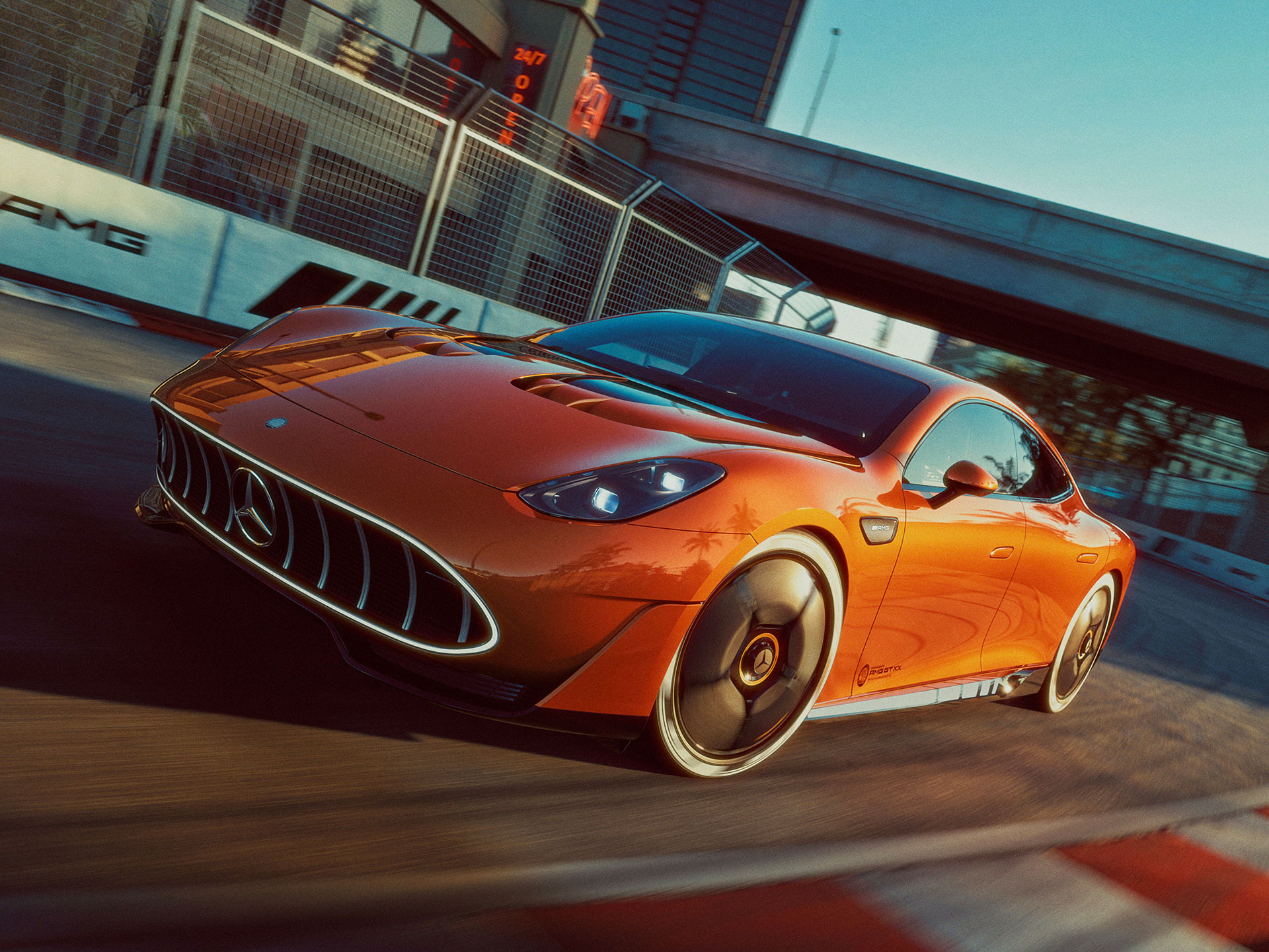 Ambition | Varumärket | Mercedes-AMG En orange Mercedes-AMG kör i hög fart på en racingbana.