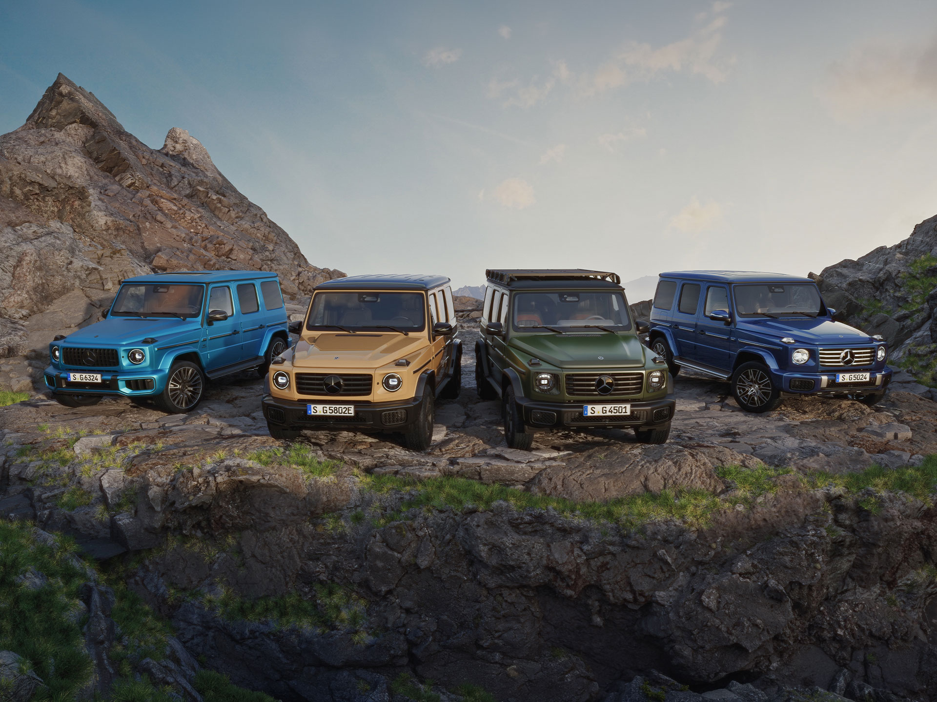 Introduktion | G-Klass Brand Area | Mercedes-Benz Mercedes-Benz G-Klass SUV:ar i flera färger på bergsterräng.