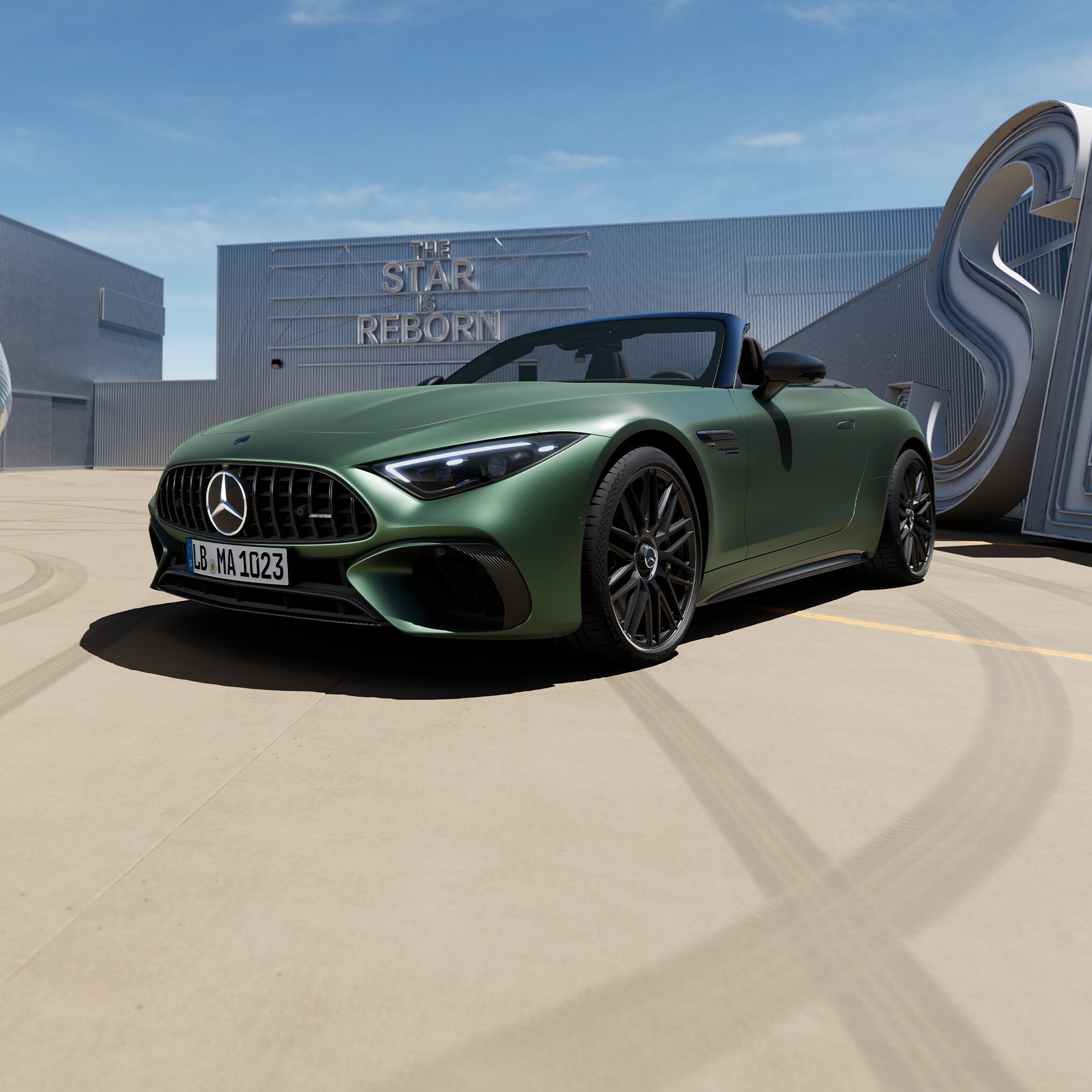Grön Mercedes-AMG SL 63 S E PERFORMANCE sedd snett framifrån