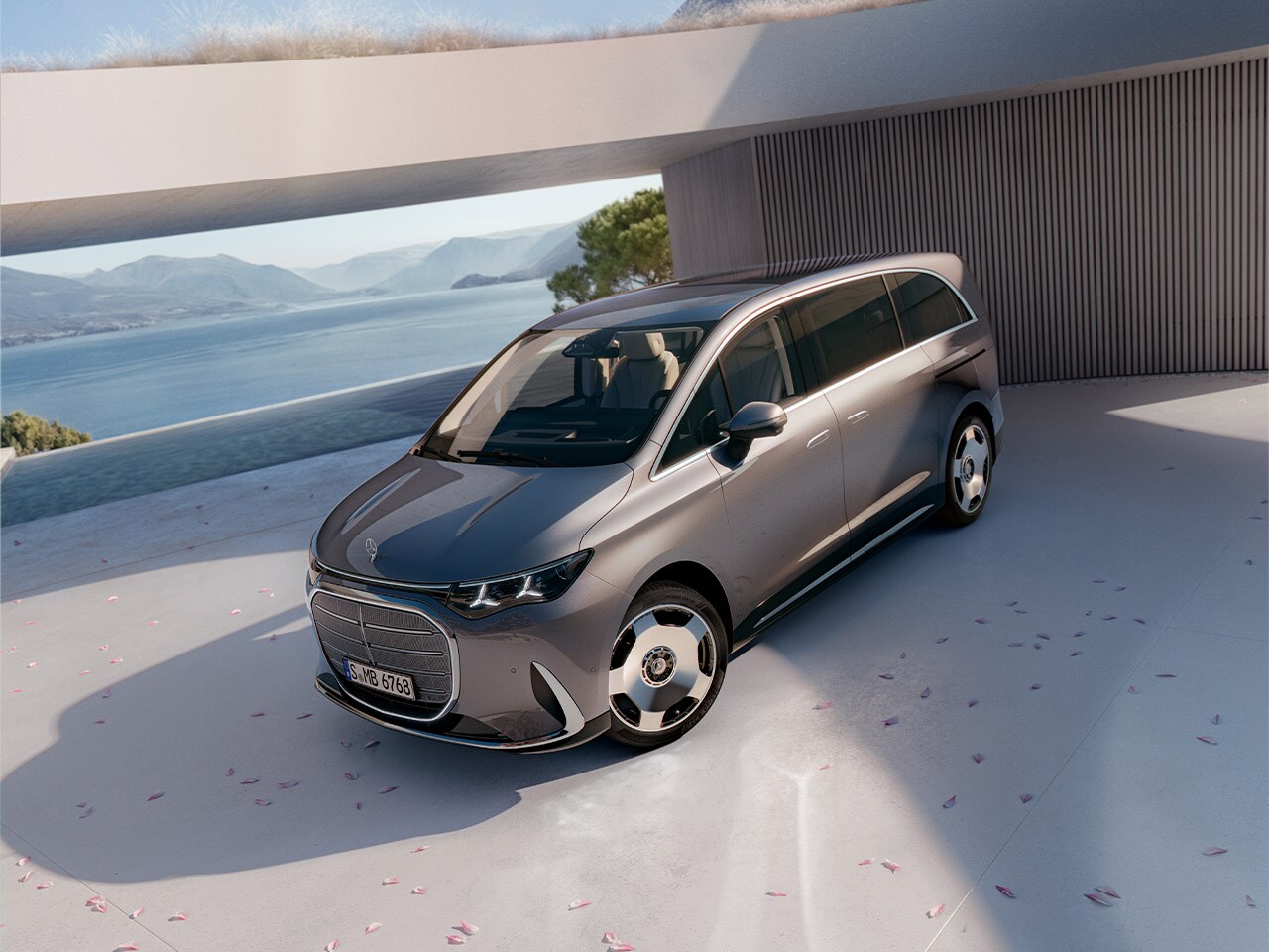 En silvrig VLE ståendes i förgrunden av hav