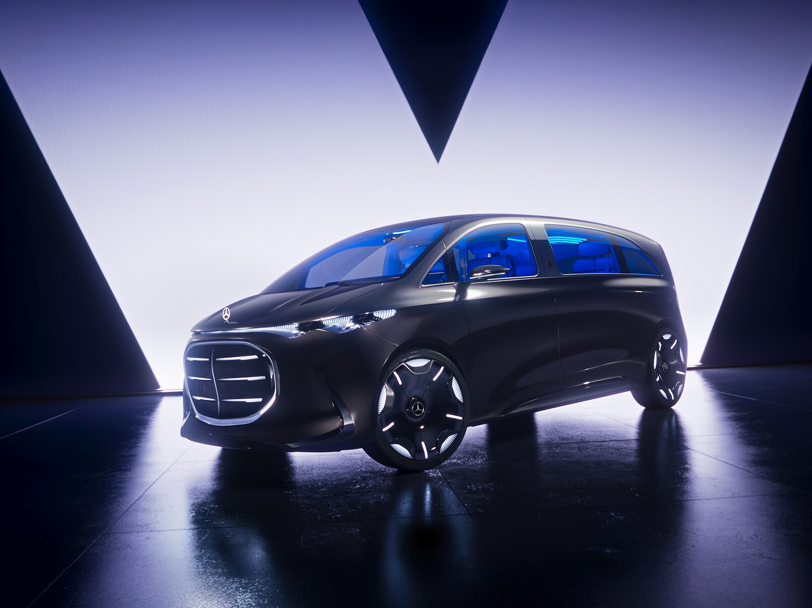 Vision V i svart med V-studiobakgrund