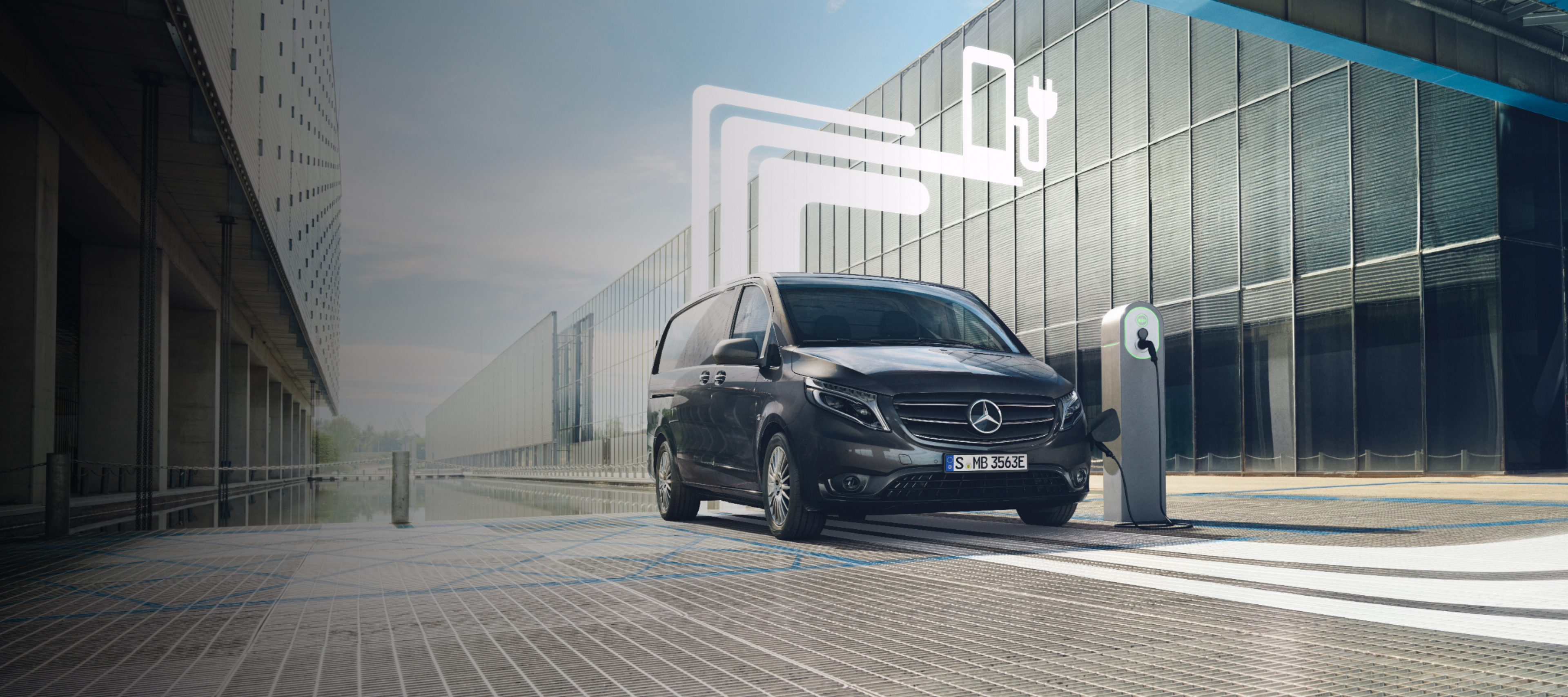 E-mobilitet | Digitala tjänster | Mercedes-Benz Transportbilar Elektrisk Mercedes-Benz laddas vid laddstation