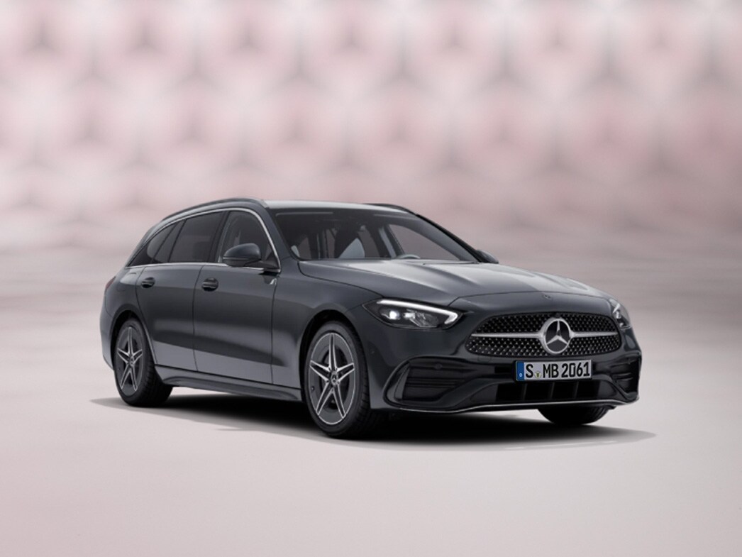 En svart Mercedes-Benz C-Klass Kombi sedd framifrån mot färgglad bakgrund.