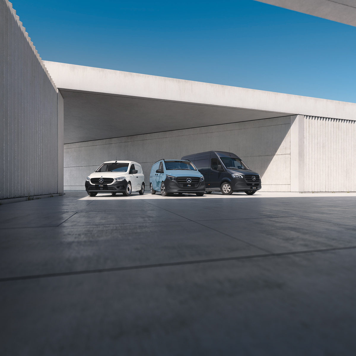 Eldrivna transportbilar | Mercedes-Benz Transportbilar Tre eldrivna transportbilar från Mercedes-Benz står på rad